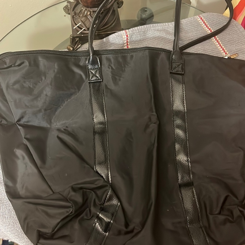 Black Bath & bodywork’s bag.